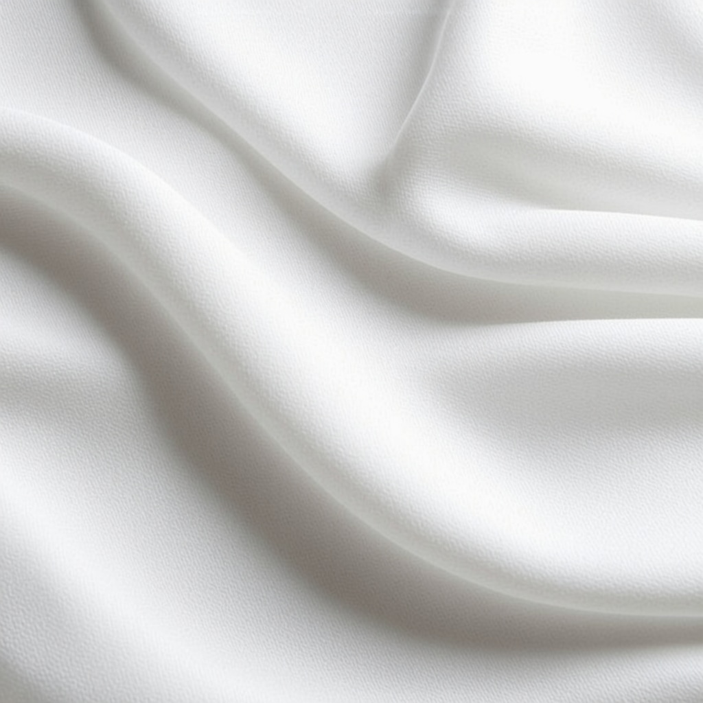 Close-up of enzymes targeting stains on delicate fabric in eco-friendly dry cleaning process.