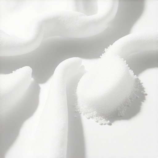 Close-up of enzyme-based biodegradable detergent on delicate fabric, eco-friendly aesthetic